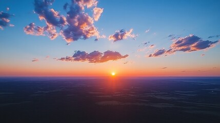 Wall Mural - Breathtaking Sunset Over Expansive Horizon with Vibrant Clouds