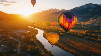 Canvas Print - Enchanting Aerial View of Hot Air Balloons Floating Over Scenic Mountain Landscape at Sunrise or Sunset