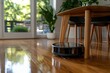 © Milos - A sleek, modern robotic vacuum cleaner glides effortlessly across a polished wooden floor with large windows letting in bright natural light, showcasing a contemporary living space.