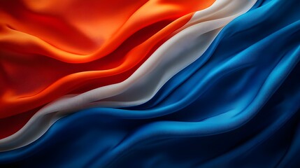 Leinwandbilder - A vivid silk textured abstract flag featuring a stunning blend of red white and blue colors appears to wave softly and gracefully in the breeze creating a dynamic and elegant visual display
