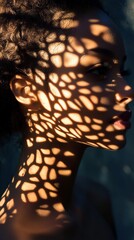 Aufkleber - Portrait of a woman with intricate shadow patterns on her face captured in soft light