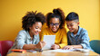 © PRODPLEUM DESIGN - Three friends joyfully collaborating on a tablet, surrounded by a vibrant yellow background.