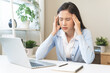 © KMPZZZ - Stressed, exhausted asian young woman, girl pain from vertigo, having migraine symptoms headache, feel unhealthy, suffering from dizziness, holding head with hand. Health care problem of people.