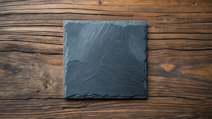 Wall Mural - Slate stone elegantly resting on wooden surface