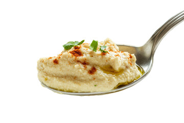 Isolated Spoon of Hummus with Paprika and Oil