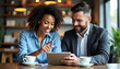© Chad - Male and Female Colleagues Engaged in a Project Discussion in a Modern Work Environment