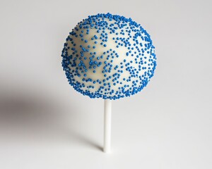 Wall Mural - Delicious White Glazed Cake Ball Topped with Vibrant Blue Sprinkles, Perfect for Sweet Treat Enthusiasts