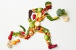 © Ilia - Creative athlete silhouette made from fresh vegetables and fruits