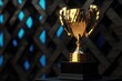 © Ева Поликарпова - A golden trophy sits atop a wooden table
