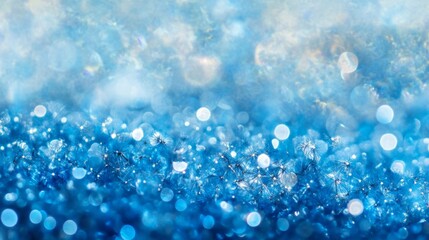Soft glowing blue bokeh particles, dreamy and elegant, calm and peaceful, abstract and vibrant, high detail and magical, luxurious atmosphere