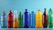 A variety of plastic bottles arranged by size and color in a studio setup.