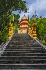 Wall Mural - View of Buddhist pagoda in Asian city.