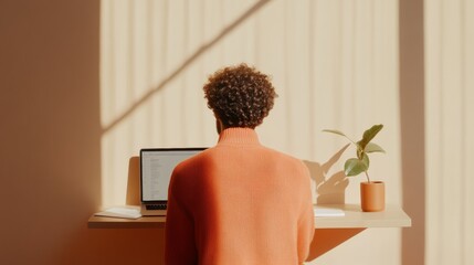 Poster - Warm Minimalist Home Office Young Black Man Engaged in Remote Work at Neutral-Hued Desk with Laptop and Coffee - Enhancing Modern Digital Collaboration in Contemporary Workspaces