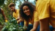 © Pichapob - Happy Group of People Gardening Together in Green Nature Setting