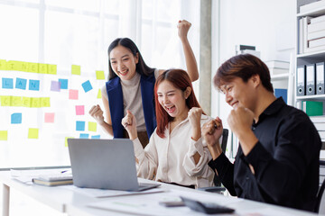 Wall Mural - Brainstorming Collaboration and  successful partnership analysis by Team of Young business Asian people working in an office workspace