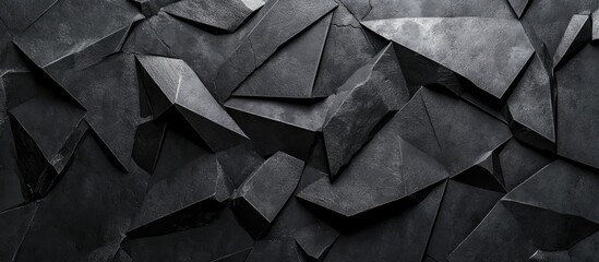 Leinwandbilder - Abstract textured background showcasing interlocking black magnesium shapes with varied angles and shadows, emphasizing depth and artistic appeal.