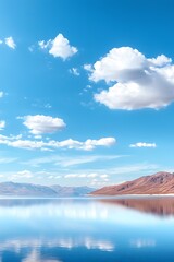 Wall Mural - a breathtaking view of a tranquil lake reflecting a majestic mountain, surrounded by fluffy clouds a