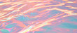 © annetdebar - Ripples on water creating colorful reflections in vibrant hues during daylight