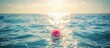 © Terry - A serene, endless ocean with a single pink rose floating on its surface, reflecting the suna??s golden rays. A symbol of everlasting love, timeless and calm.