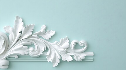 White ornate floral molding on a light blue wall