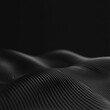 © Momphoto - A smooth, flowing abstract texture featuring soft, wavy lines in varying shades of black against a dark backdrop.