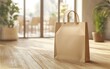 © Marina - Stylish paper grocery bag mockup sitting on a warm-toned wooden floor with a blurred cozy interior background