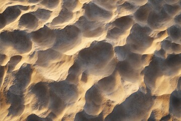 Poster - Close-up of textured sand dunes at sunset, showing patterns and shadows.