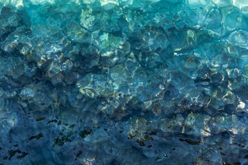 Wall Mural - Deep blue sea water surface with shiny ripple. Natural background