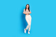 © deagreez - Photo of adorable cute woman wear stylish print clothes crossed arms isolated on blue color background