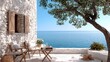 © Giman - Mediterranean patio ocean view; relaxing outdoor furniture; summer holiday