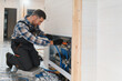© Serhii - Pipe fitter mounted underfloor heating. Heating system and underfloor heating. Central heating