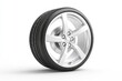 © Tida - Alloy Wheel and Tire Stock Photo - A single alloy wheel with a black tire, isolated on white background. Perfect for automotive websites or publications.