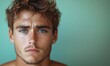 © serdon - Portrait of a young man with a furrowed brow, showing a pouting expression of annoyance