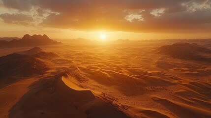 Wall Mural - Aerial desert sunset, dunes, mountains, dramatic sky.