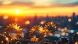 © Thirakun - Close-up of shining golden gears with a blurred sunset horizon behind them