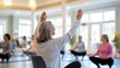 © Anna - Senior fitness class with people practicing yoga indoors for wellness and relaxation