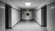 © musa - Long, empty hallway with doors and lights.