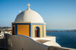 © Matteo Colombo - Iconic yellow and white church in Santorini, Greece
