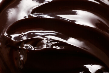 Canvas Print - Closeup view of brown melted chocolate as background