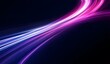 © Ranazain - Abstract glowing pink and blue light trails on dark background representing speed and motion