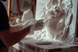 © eartist85 - Sculptor making three-dimensional artwork plaster sculpture