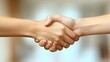 © NOPPHINAN - Close-up of a handshake between two people, symbolizing trust, agreement, partnership, and cooperation in a professional or personal context.