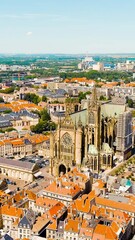 Wall Mural - Vertical video. Metz, France. Metz Cathedral. View of the historical city center. Summer, Sunny day, Aerial View. Rich colors