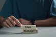 © Pakin - Conclusion summary concept, Person with Final Thoughts on wooden block.