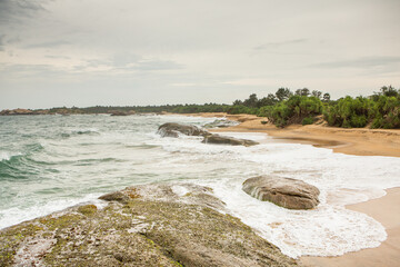 The beautiful beach on the coast of the Indian Ocean in Sri Lanka.