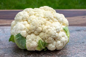 Wall Mural - Healthy vegetarian food concept, raw cauliflower white cabbage ready for cooking