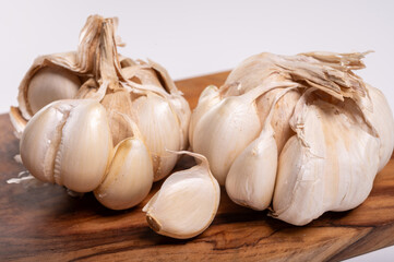 Wall Mural - Cooking with dried French white garlic