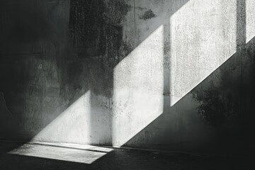 Aufkleber - Shadows cast by sunlight create an artistic pattern on a textured concrete wall in a dimly lit space