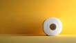 © horizon - Toilet paper roll positioned against pale yellow backdrop showcases textured paper detail with right-aligned placement and soft shadow effects.