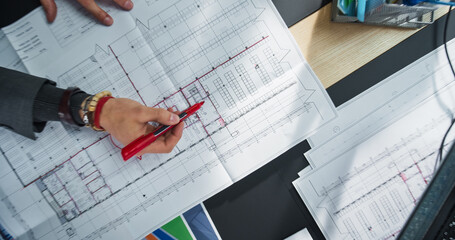 Aufkleber - Top Down View: Close Up on Engineer's Hand. Person Pointing with Red Pen on a Real Estate Project Blueprints or Architectural Plan